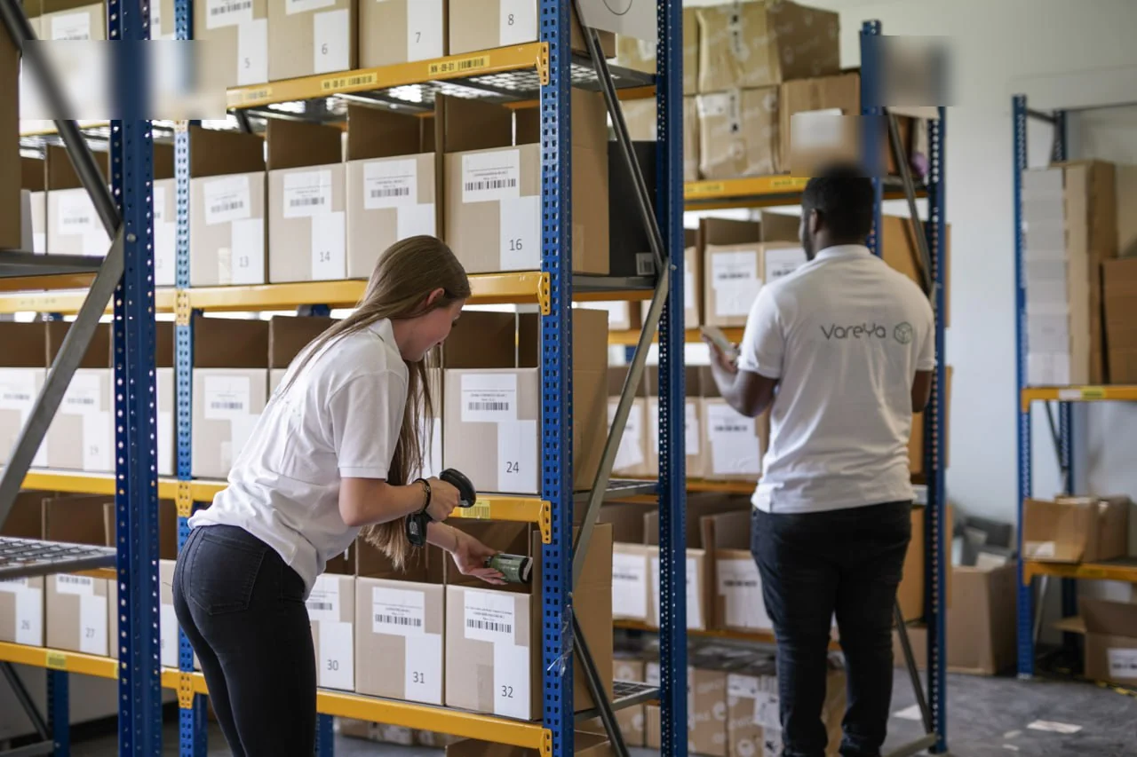 Two team members picking orders at numbered pick locations.